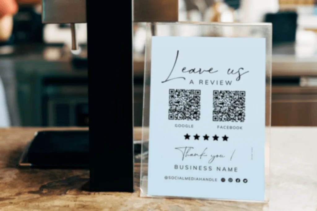 Image of QR code on table stand requsting reviews